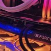 На изображении изображен графический процессор Zotac Gaming GeForce RTX 4070 Super Trinity Black Edition, установленный на компьютере.