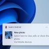 Снимок экрана уведомления Windows 11, отображающего фотографию, сделанную на телефоне Android